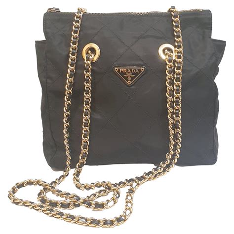 prada black and gold bag